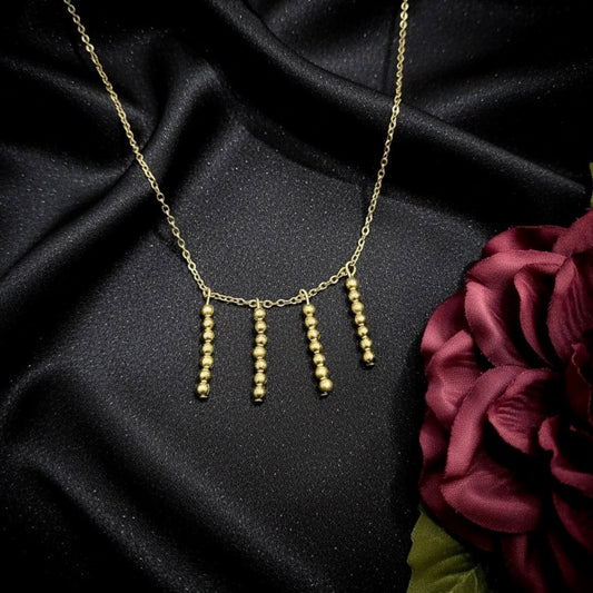 Gold Sticks Necklace